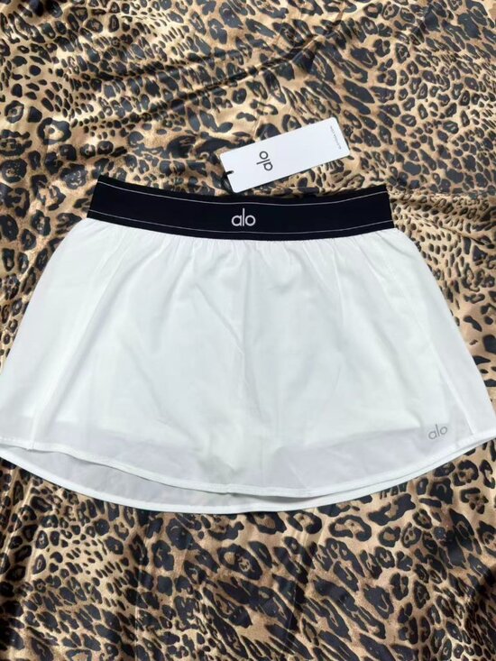 ALO Yoga Dresses & Skirts - Brand new with tags Alo Yoga🥯Match Point Tennis Skirt White